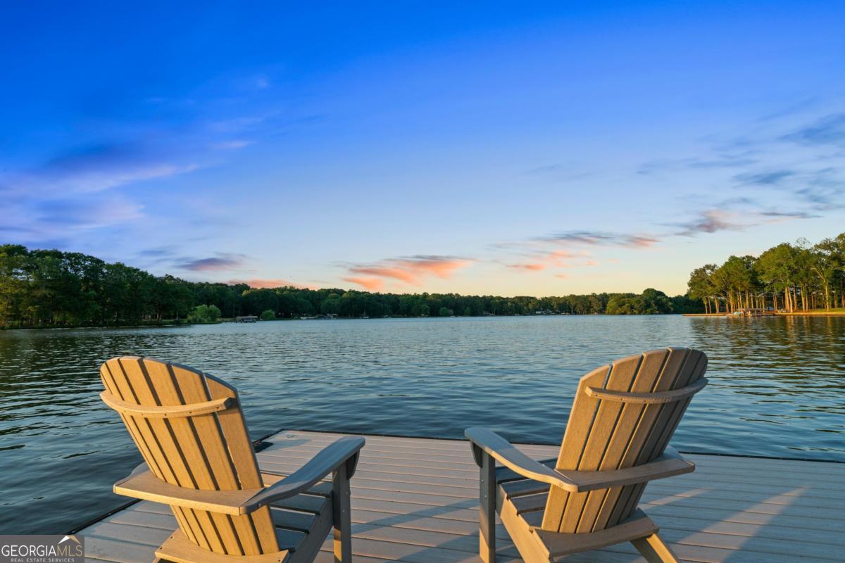 1010 Azalea Lane Buckhead, GA 30625 - Photo 6 of 67 a view of a lake from balcony with outdoor seating