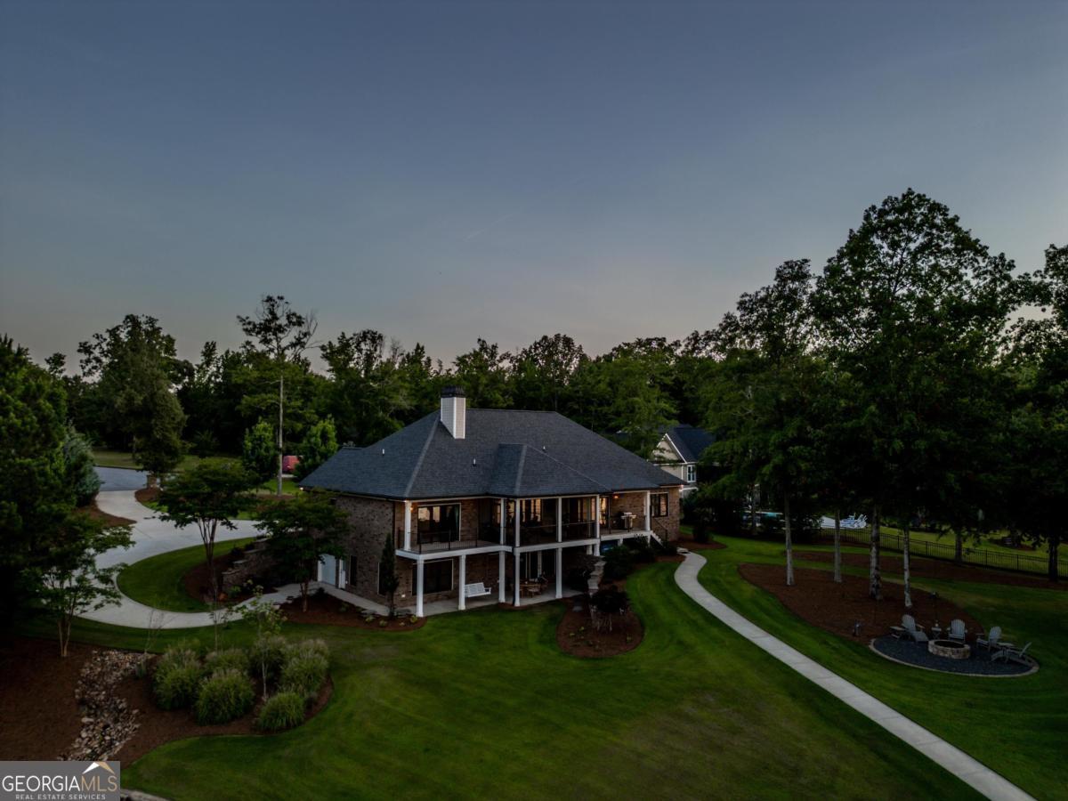 1010 Azalea Lane Buckhead, GA 30625 - Photo 64 of 67 a view of a house with garden and a sitting area