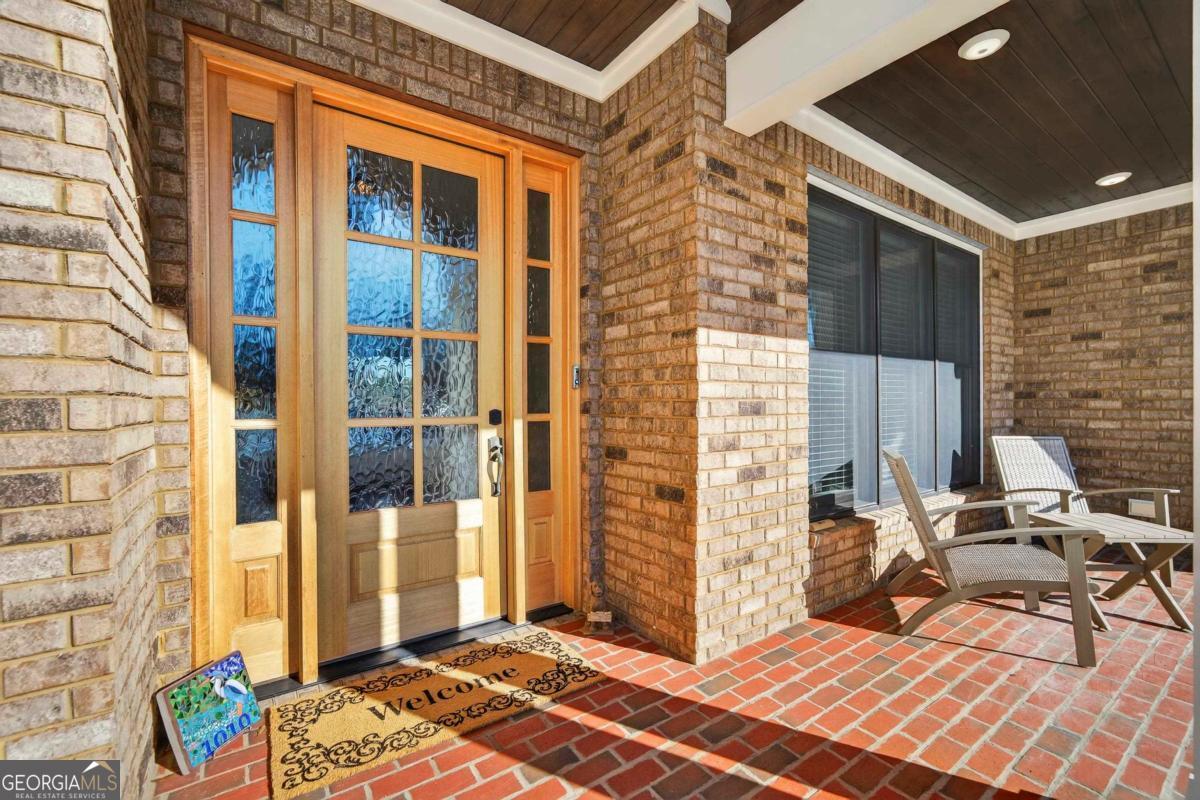 1010 Azalea Lane Buckhead, GA 30625 - Photo 8 of 67 a view of balcony with two chairs and a window