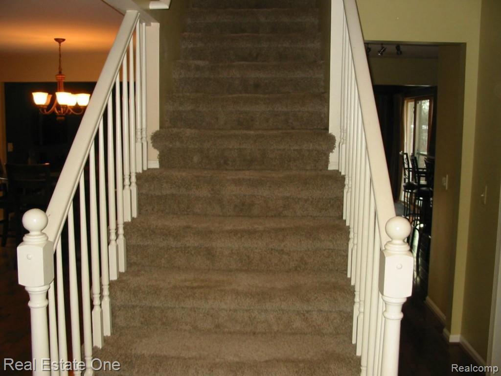1600 Dunston Road Canton, MI 48188 - Photo 16 of 39 Stair Case and Upper Level Feature New Carpet.