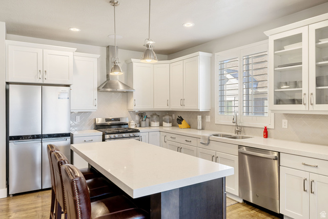 2745 Red Barn Road South Heber City, UT 84032 - Photo 8 of 51 Kitchen featuring stainless steel appliances, white cabinets, decorative light fixtures, a kitchen island, and recessed lighting