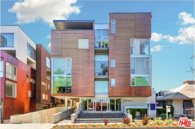 a front view of a building and a street