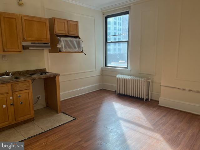 1324 Locust Street, Unit 715 Philadelphia, PA 19107 - Photo 3 of 4 a view of a kitchen with electric appliances