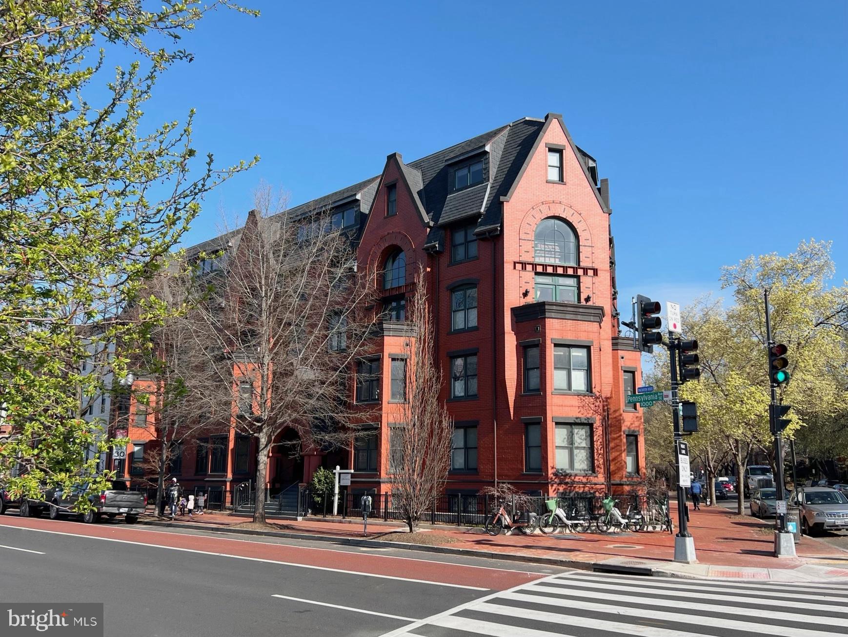 1020 Pennsylvania Ave. Southeast, Unit 103 Washington, DC 20003 - Photo 1 of 18 a view of a tall building next to a road