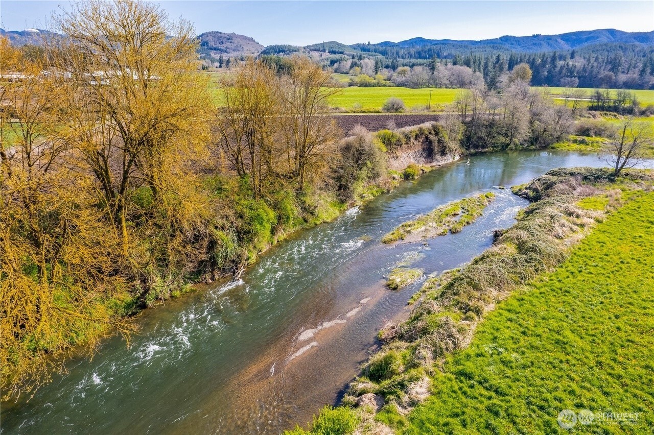 X4 Oxbow Road Raymond, WA 98577 - Photo 3 of 5 a view of swimming pool with a garden