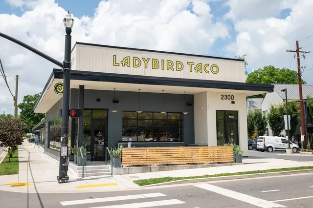 a view of a car park in front of house