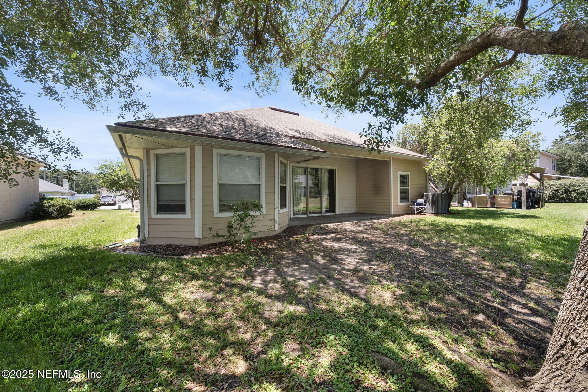 96316 Ridgewood Circle Fernandina Beach, FL 32034 - Photo 32 of 32 a view of a house with yard and a garden