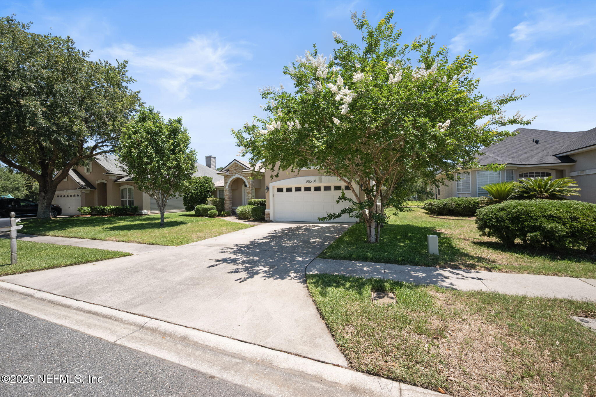 96316 Ridgewood Circle Fernandina Beach, FL 32034 - Photo 4 of 32 a view of a house with a yard