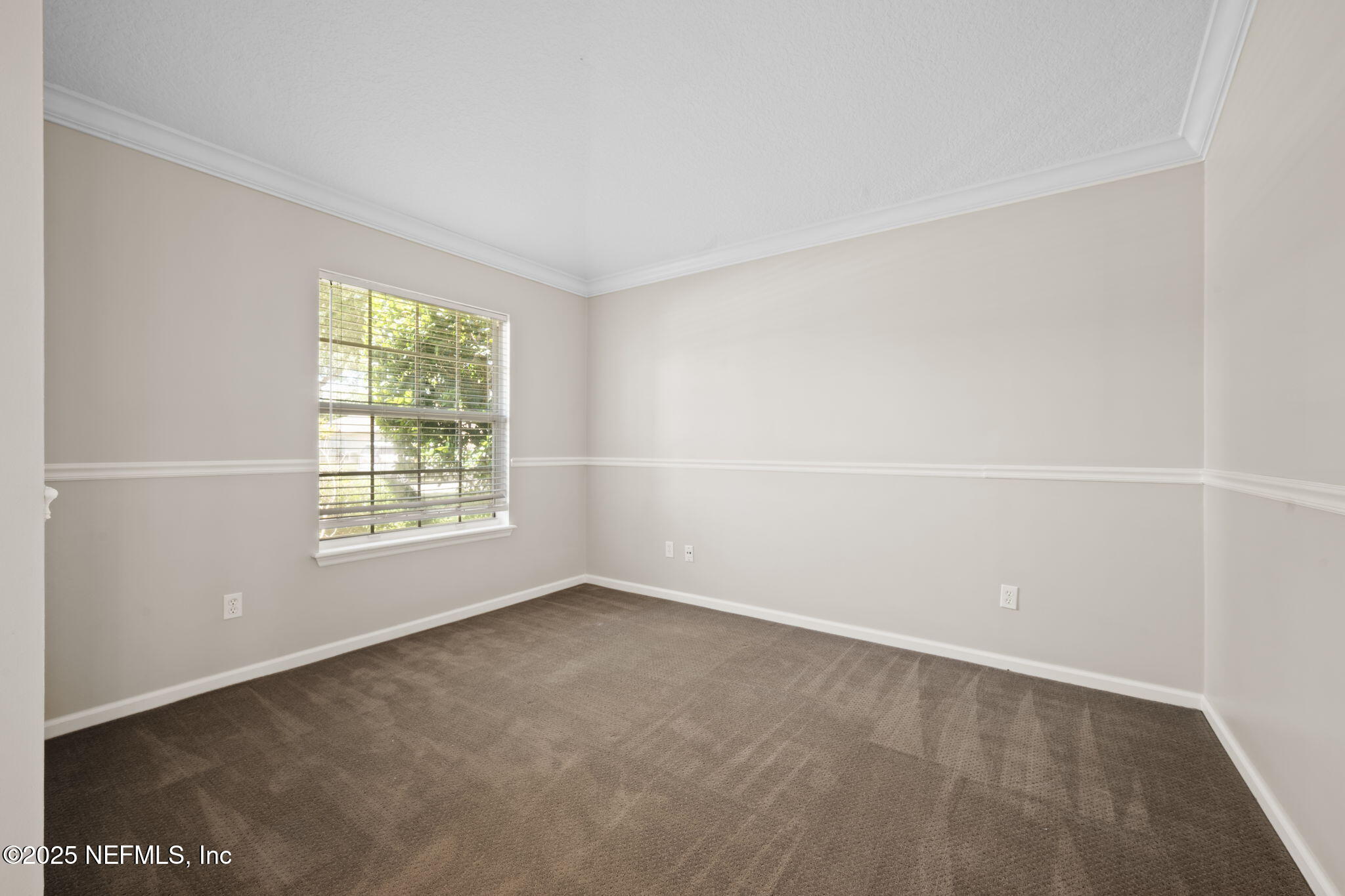 96316 Ridgewood Circle Fernandina Beach, FL 32034 - Photo 7 of 32 an empty room with a window