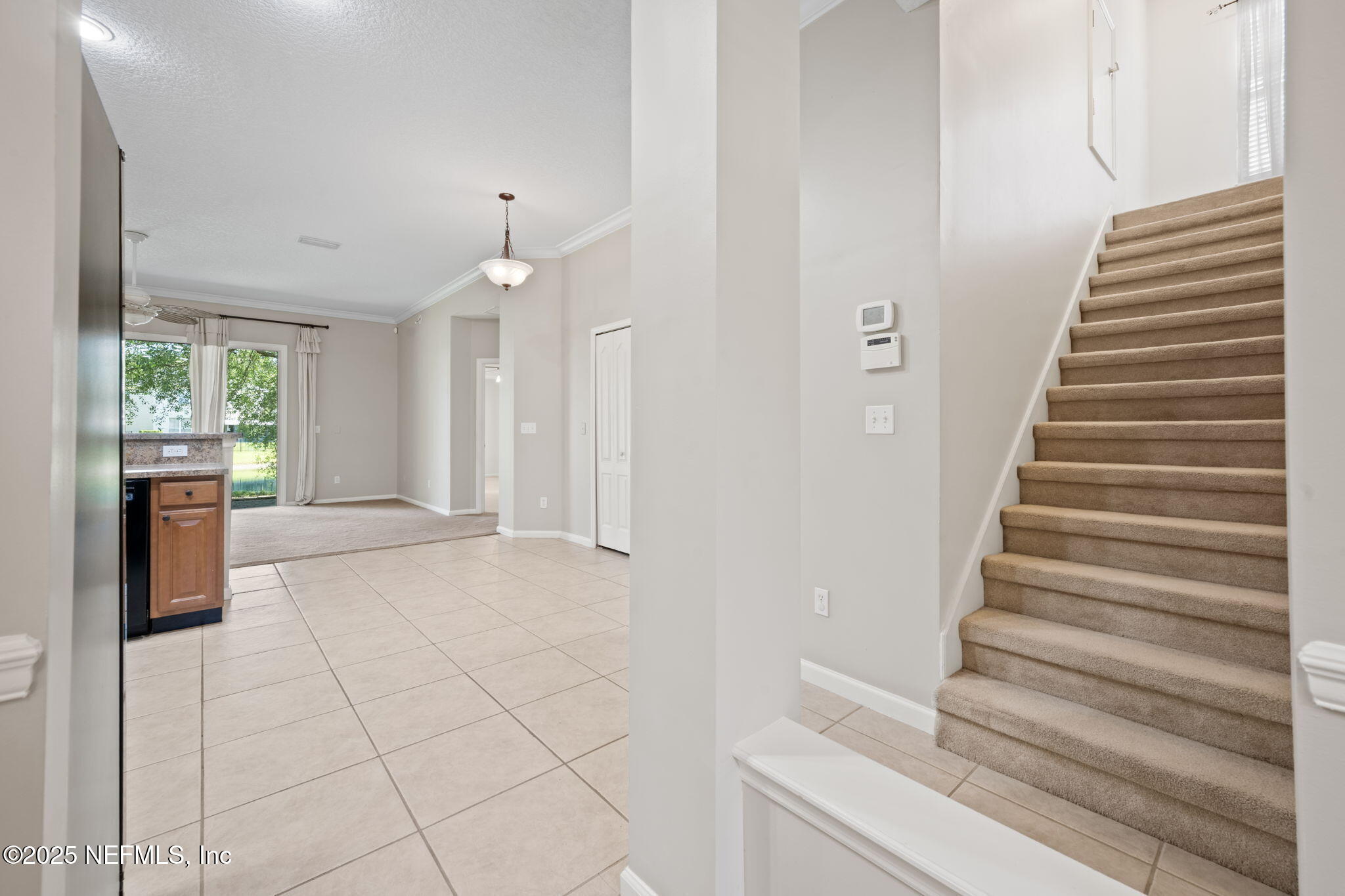 96316 Ridgewood Circle Fernandina Beach, FL 32034 - Photo 8 of 32 a view of entryway and hall with wooden floor