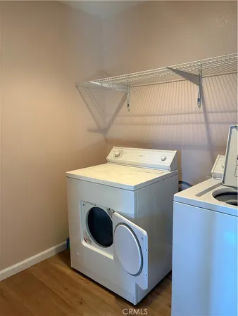 a bedroom with a bed and a closet