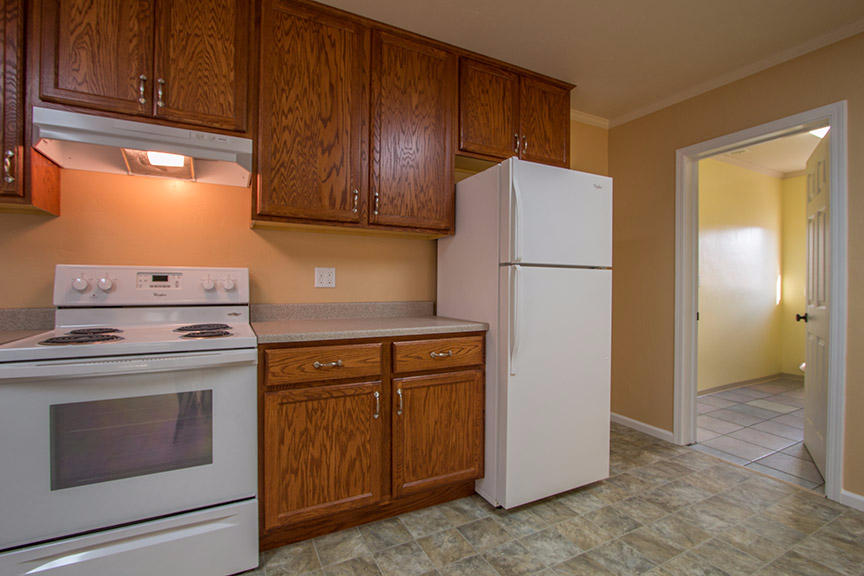1732 Ash Street Fortuna, CA 95540 - Photo 12 of 37 a kitchen with a stove refrigerator and cabinets