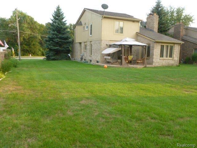 3443 15 Mile Road Sterling Heights, MI 48310 - Photo 2 of 25 HUGE PRIVATE BACKYARD