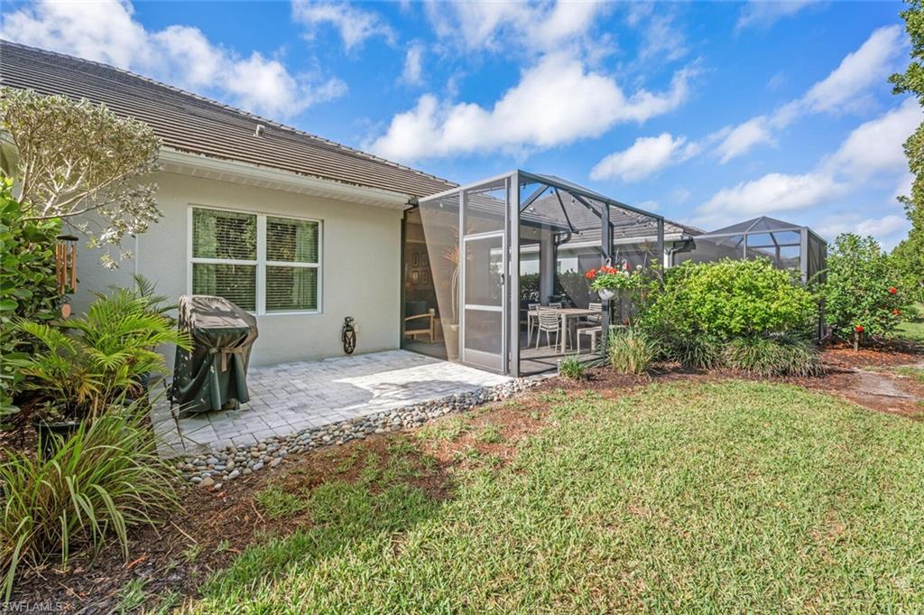 2211 Marquesa Circle Naples, FL 34112 - Photo 20 of 28 a house view with a garden space