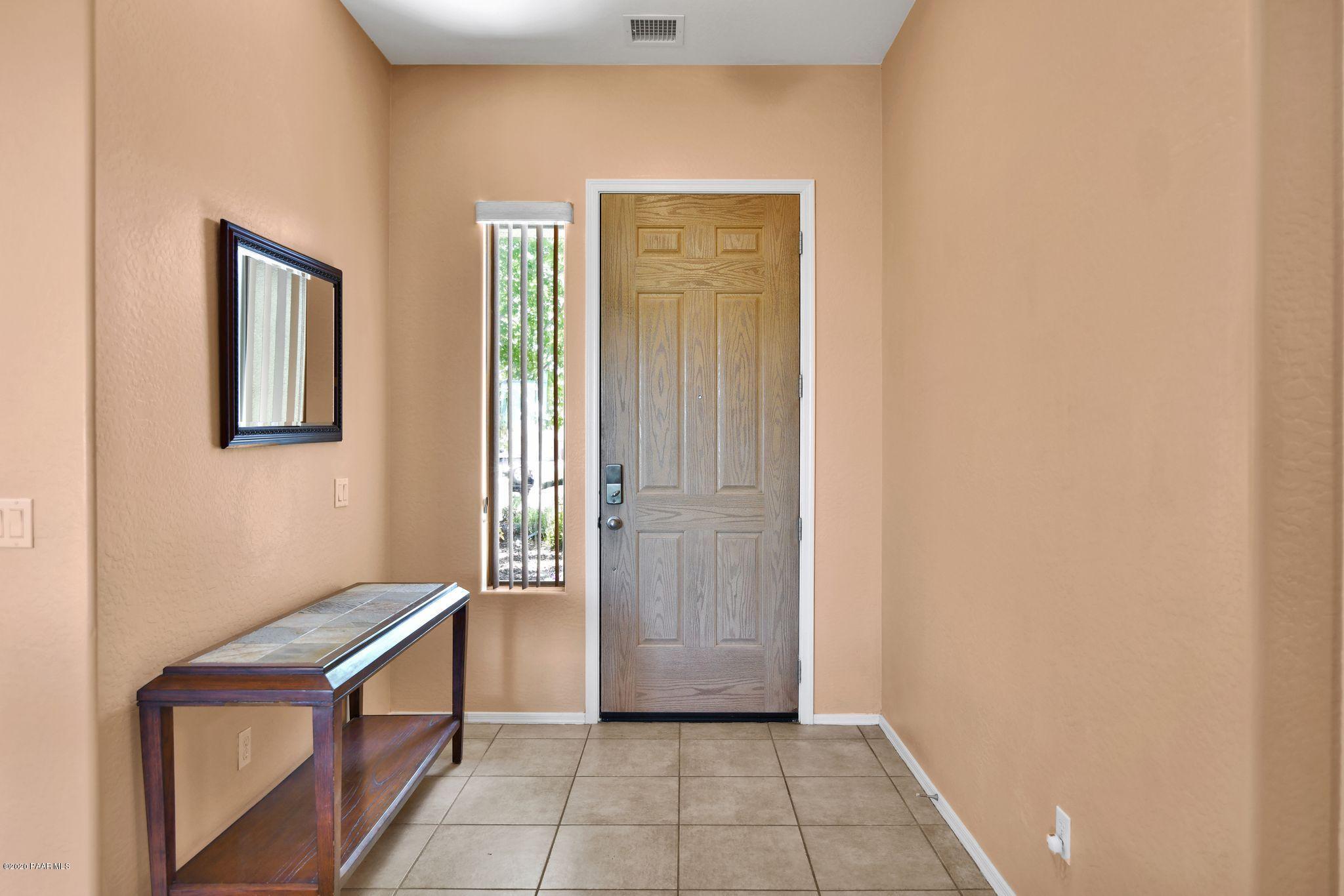 4762 Edgemont Road Prescott Valley, AZ 86314 - Photo 3 of 36 a view of an entryway with front door
