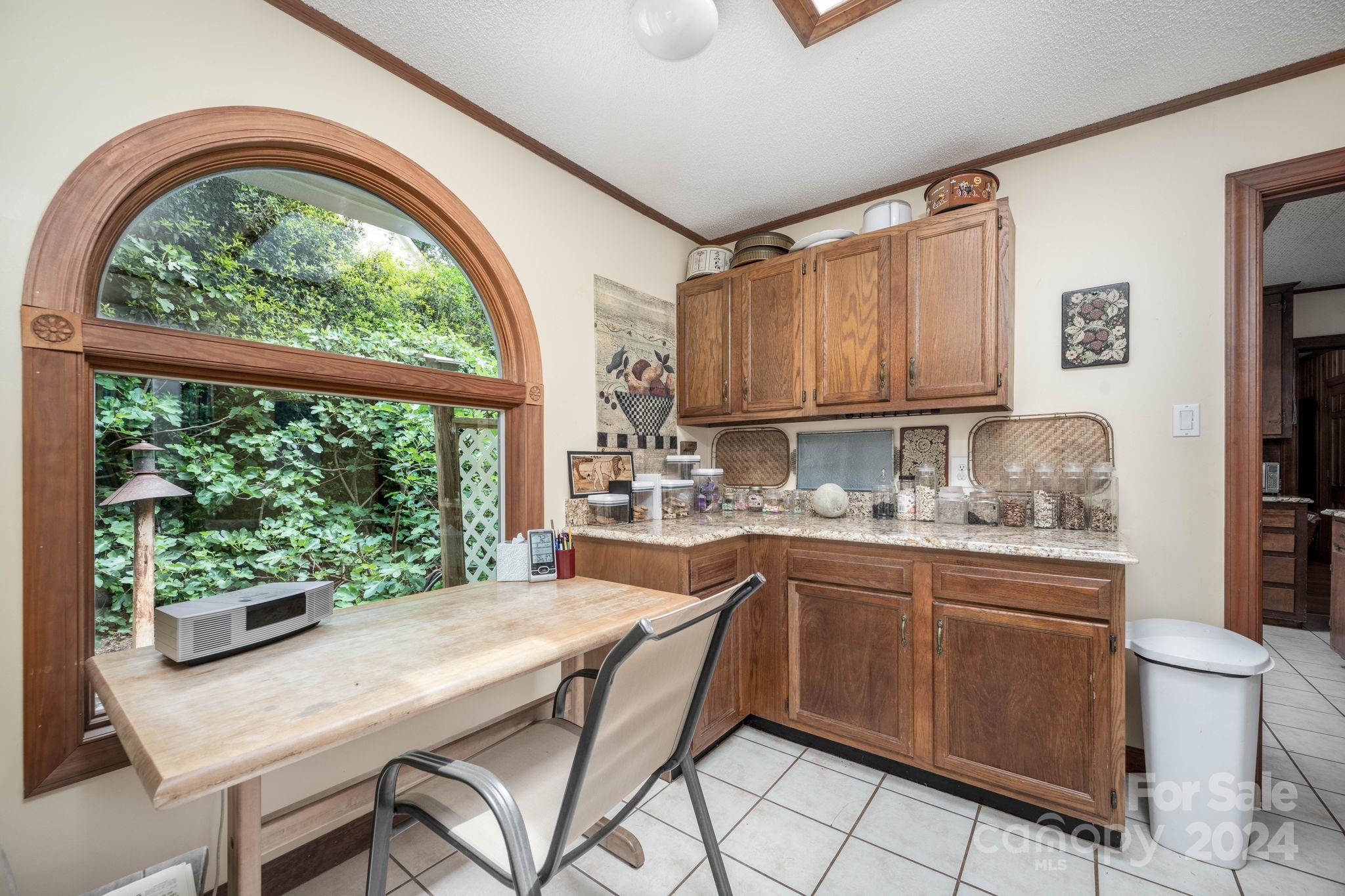 559 Lorimer Road Davidson, NC 28036 - Photo 15 of 39 a kitchen with a stove a sink a refrigerator and window