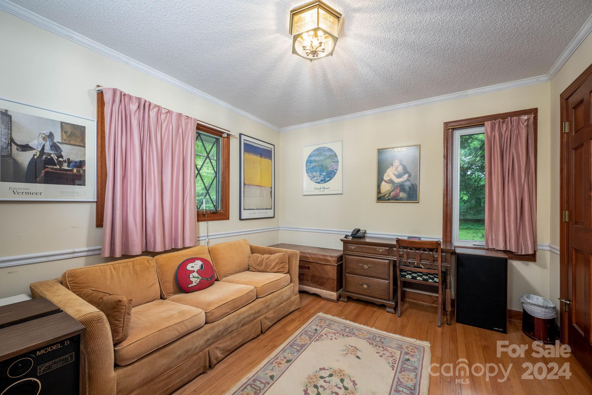559 Lorimer Road Davidson, NC 28036 - Photo 29 of 39 a living room with furniture and a window