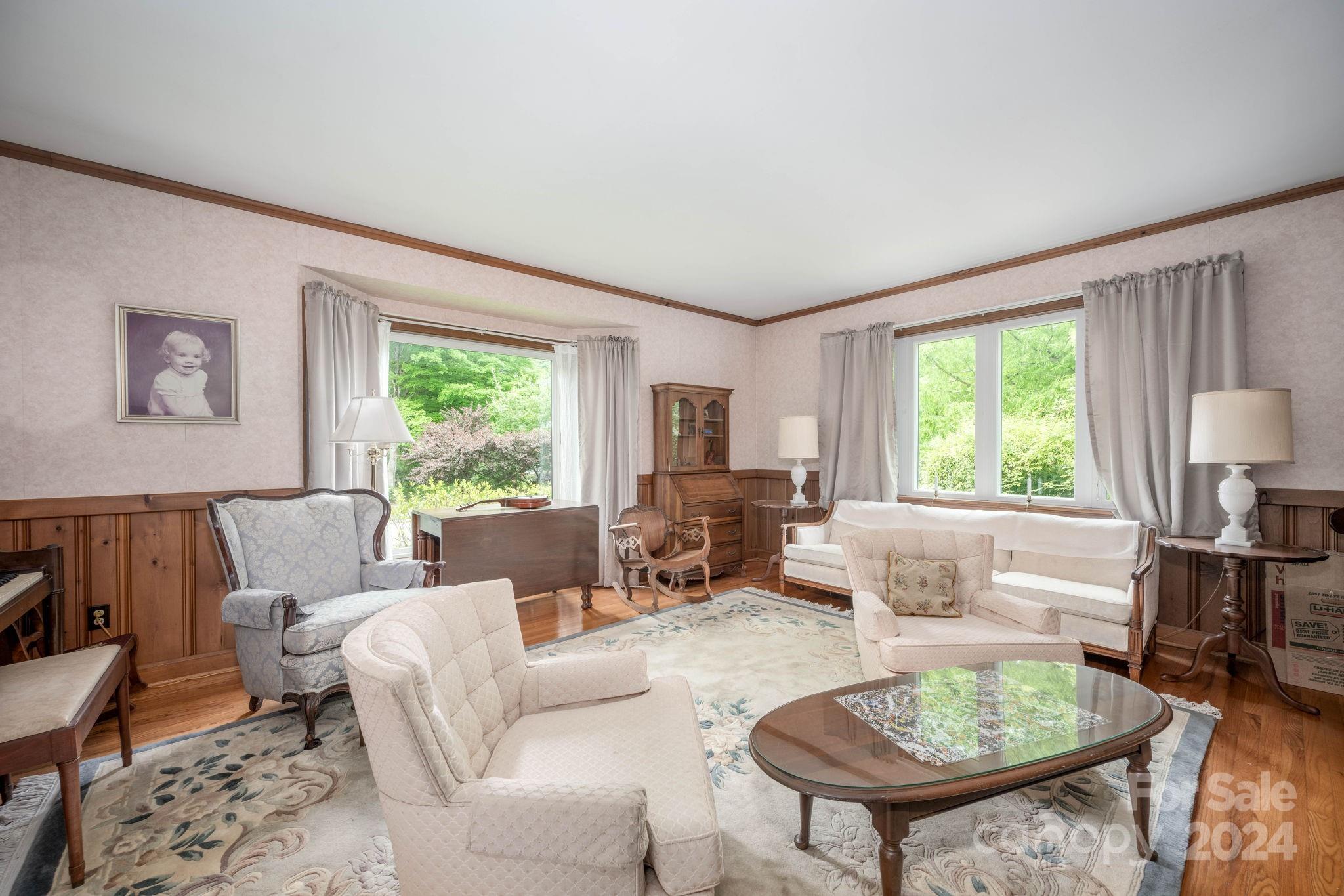 559 Lorimer Road Davidson, NC 28036 - Photo 6 of 39 a living room with furniture and a large window