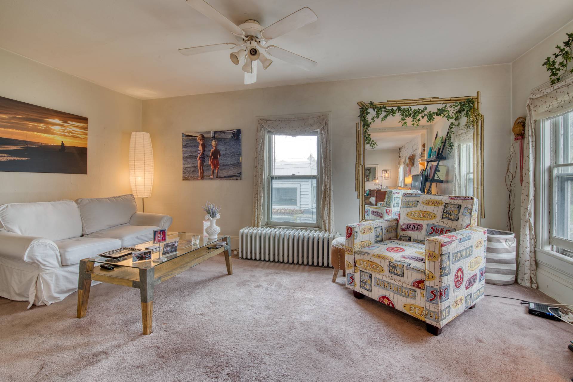 57 Mill Road Westhampton Beach, NY 11978 - Photo 18 of 20 a living room with furniture and a window
