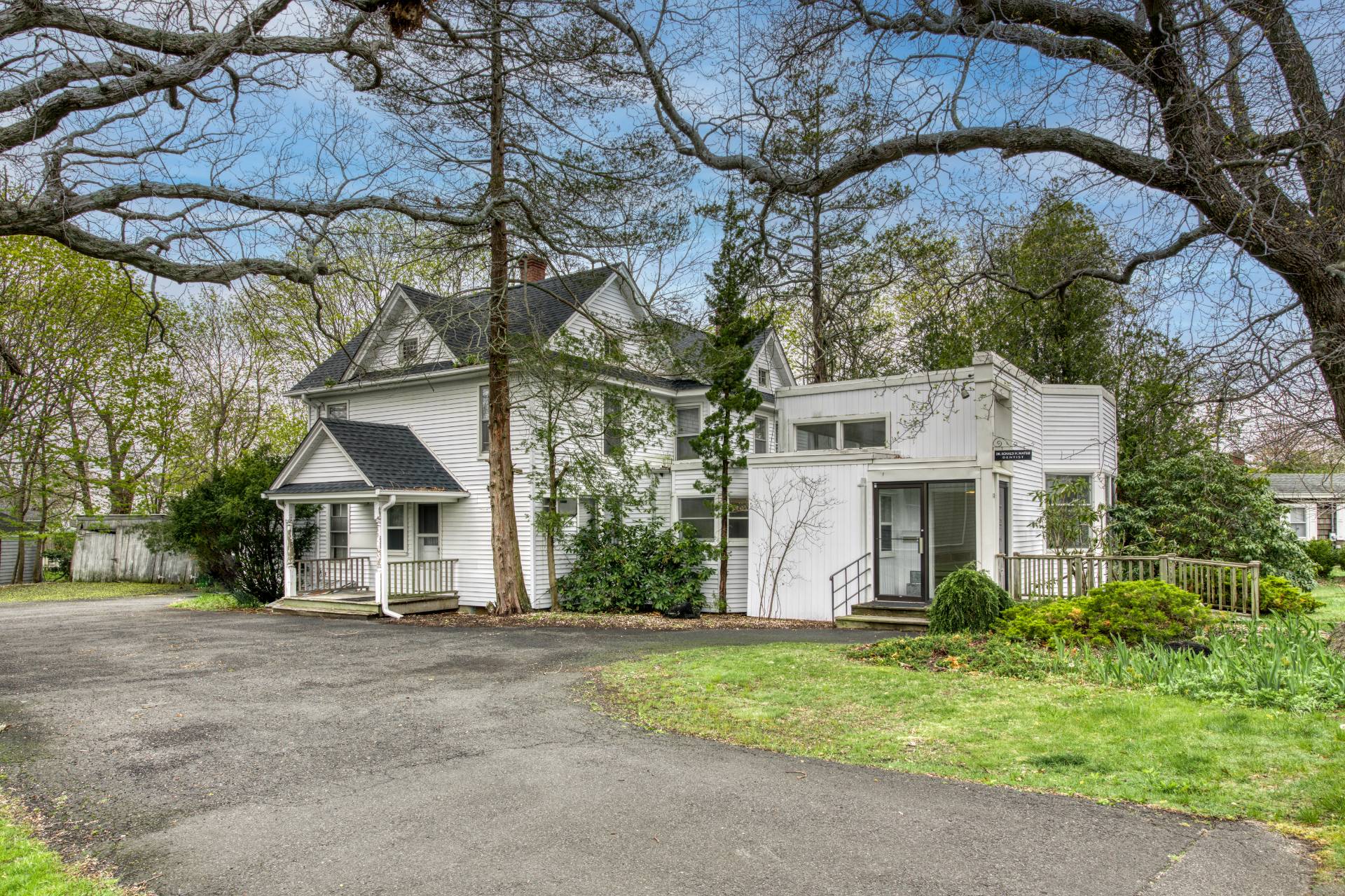 57 Mill Road Westhampton Beach, NY 11978 - Photo 10 of 20 front view of a house with a yard