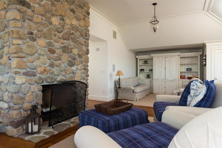 31 Starboard Lane Mashpee, MA 02649 - Photo 19 of 35 a living room with furniture and a fireplace