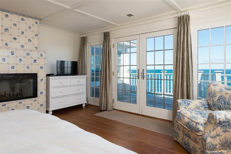 31 Starboard Lane Mashpee, MA 02649 - Photo 23 of 35 a living room with furniture a flat screen tv and a fireplace