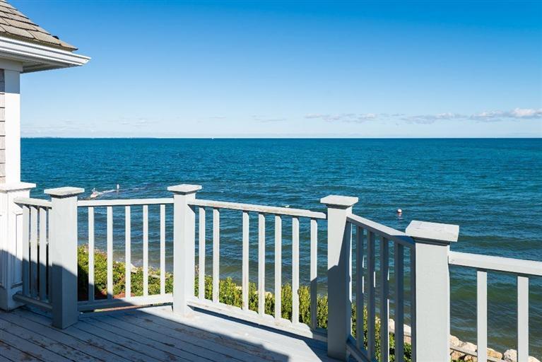 31 Starboard Lane Mashpee, MA 02649 - Photo 24 of 35 a view of a balcony with wooden floor and fence