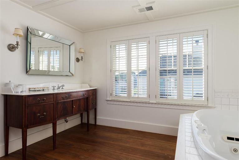 31 Starboard Lane Mashpee, MA 02649 - Photo 28 of 35 a bathroom with a sink mirror and a bathtub
