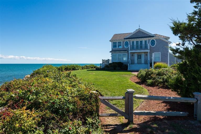 31 Starboard Lane Mashpee, MA 02649 - Photo 3 of 35 a view of a big yard with table and chairs with wooden fence