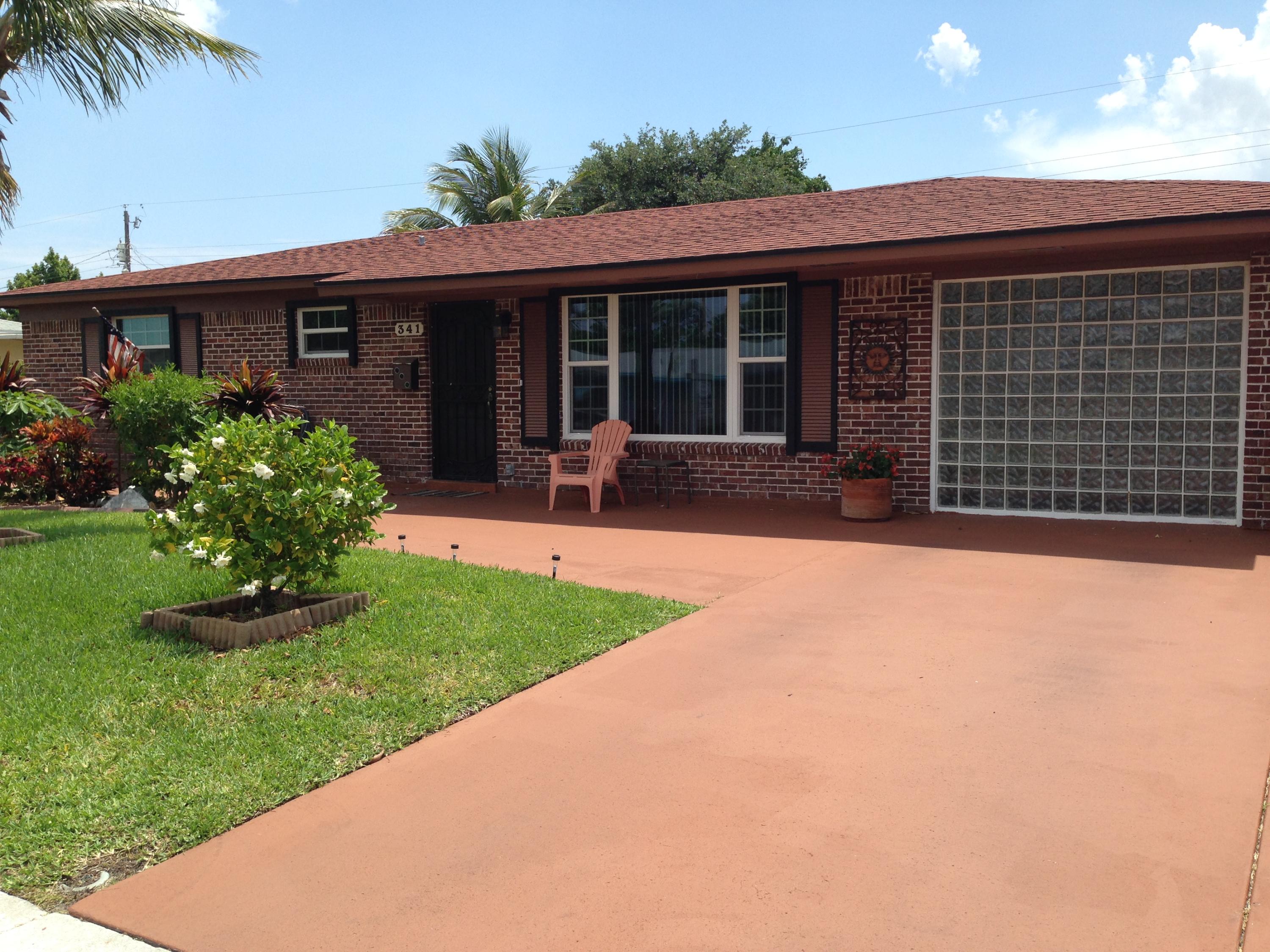 341 West 22nd Street Riviera Beach, FL 33404 - Photo 3 of 27 Front of house view 1
