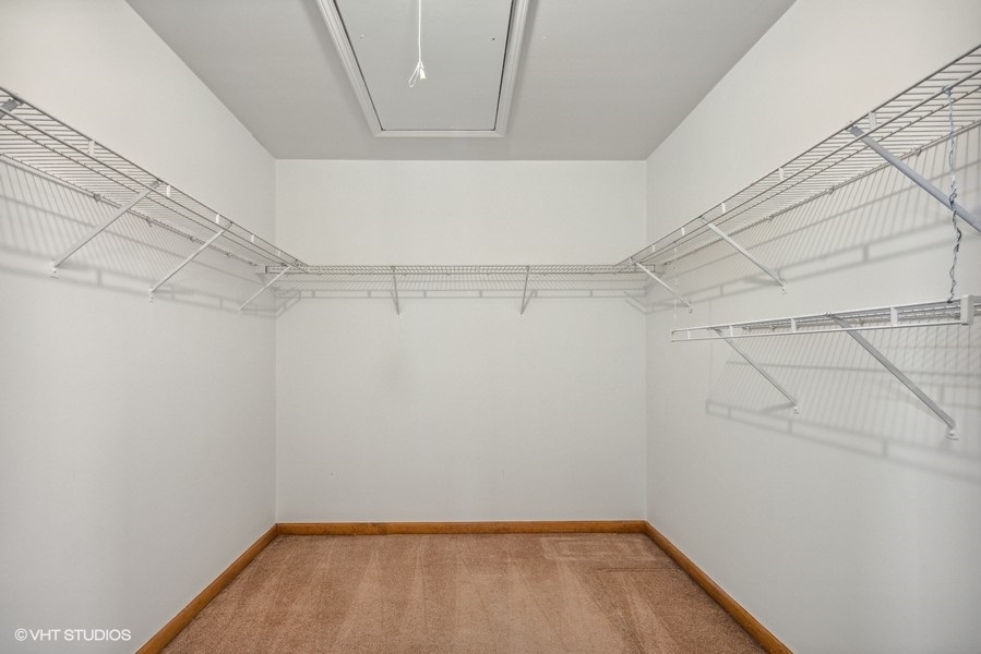 208 South Rush Street Itasca, IL 60143 - Photo 20 of 33 a view of a room with racks on the wall