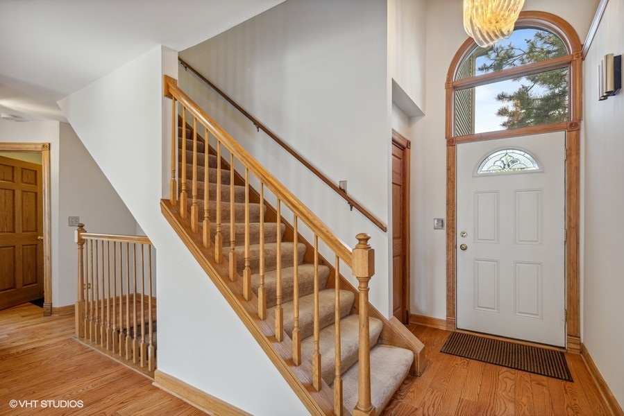 208 South Rush Street Itasca, IL 60143 - Photo 2 of 33 a view of entryway with wooden floor
