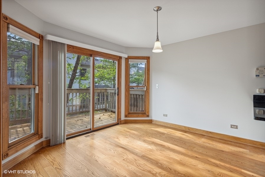 208 South Rush Street Itasca, IL 60143 - Photo 6 of 33 a view of an empty room with glass door