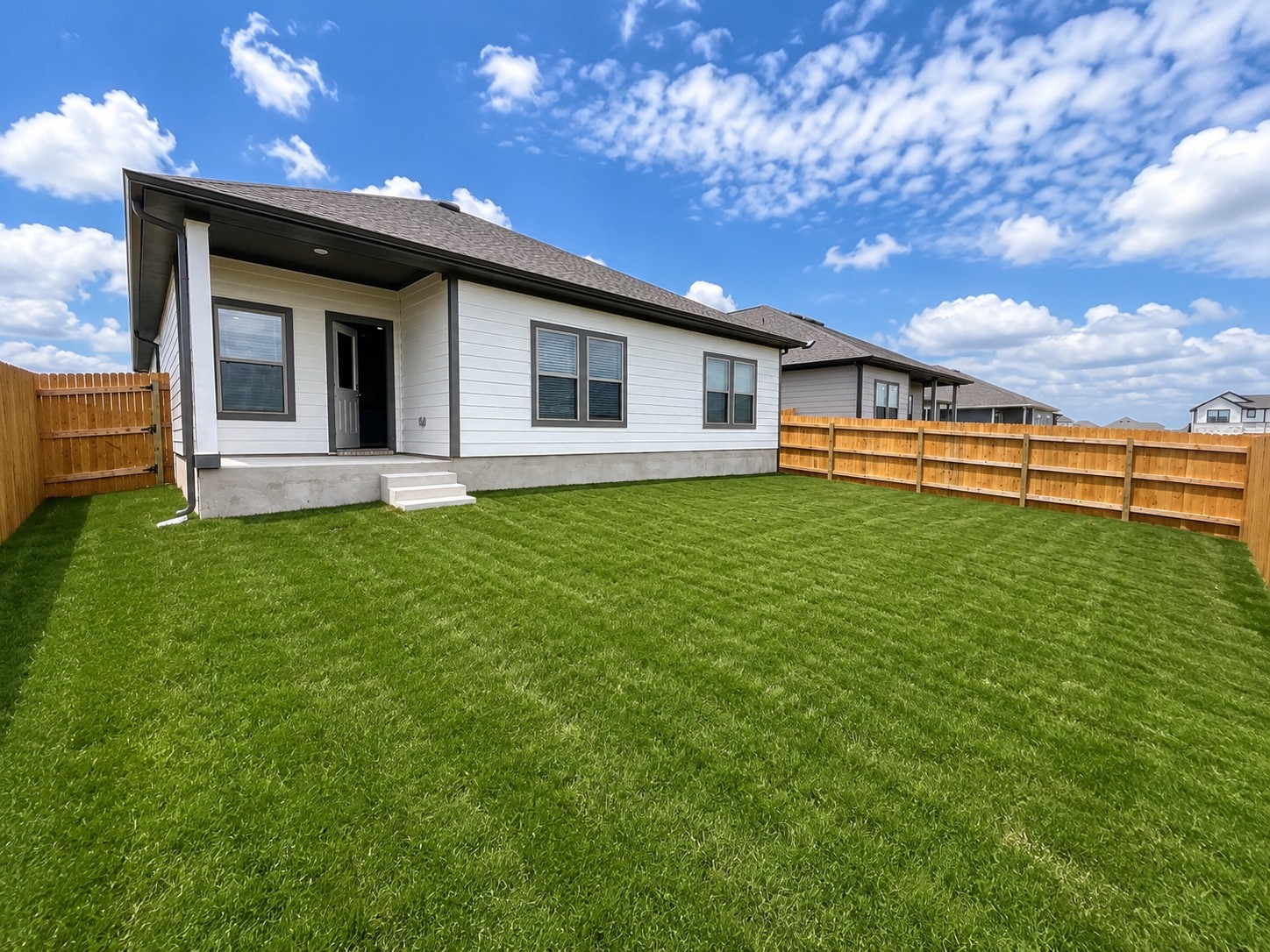 164 Wind Hill Jarrell, TX 76537 - Photo 21 of 22 Rear of Home and Private Backyard