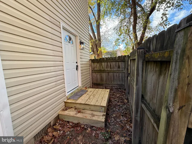 a view of a back yard of the house