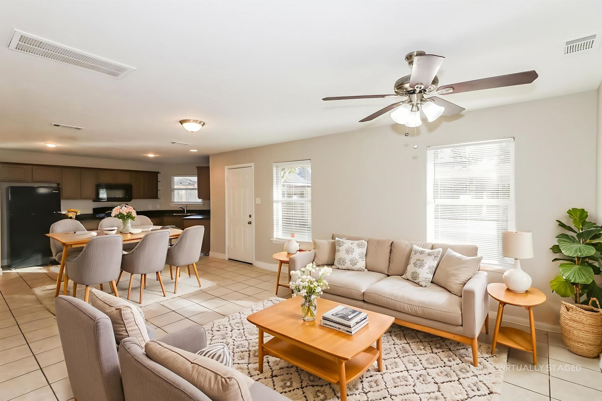214 North Native Lane Houston, TX 77022 - Photo 4 of 18 a living room with furniture and a large window