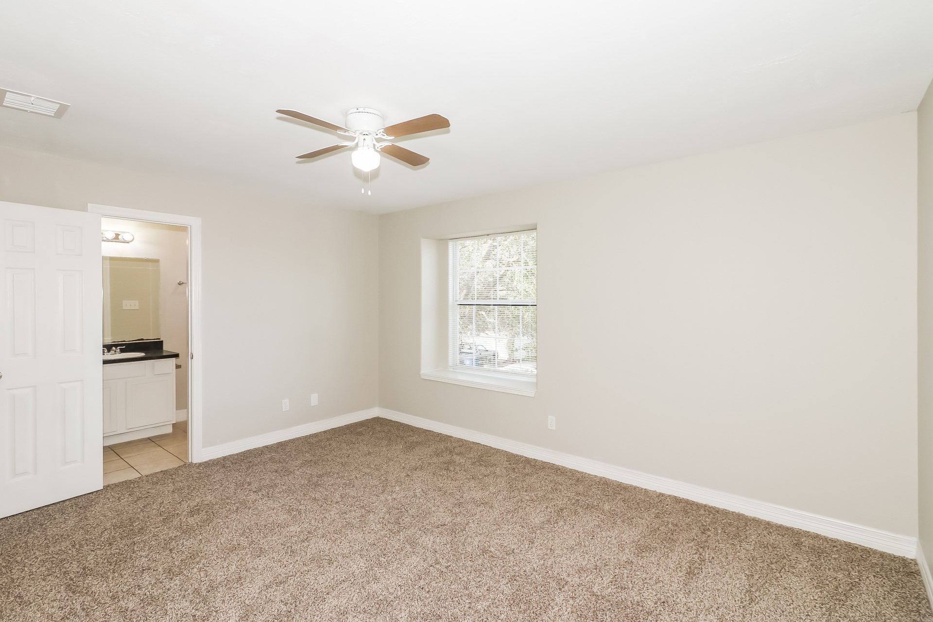 214 North Native Lane Houston, TX 77022 - Photo 8 of 18 a view of an empty room with a window