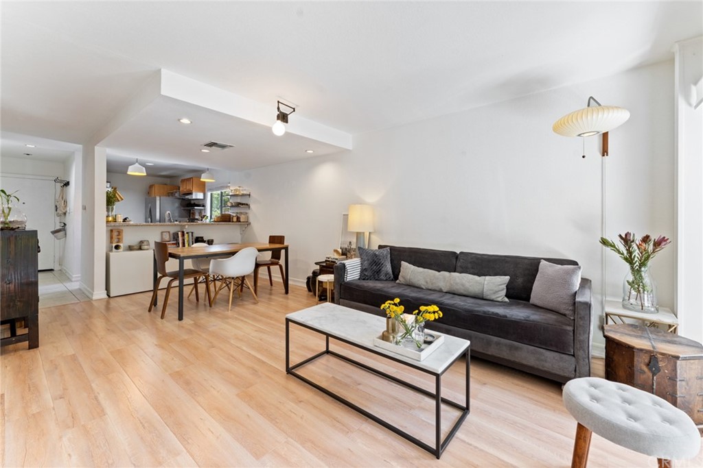 350 Burchett Street, Unit 101 Glendale, CA 91203 - Photo 1 of 27 a living room with furniture and wooden floor