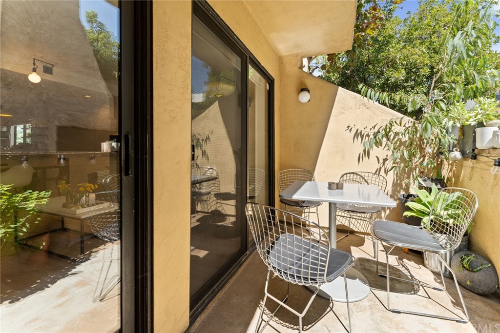 350 Burchett Street, Unit 101 Glendale, CA 91203 - Photo 12 of 27 a view of balcony with wooden floor