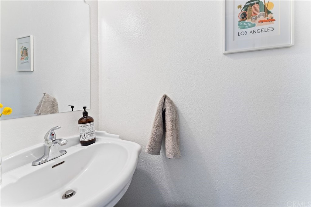 350 Burchett Street, Unit 101 Glendale, CA 91203 - Photo 13 of 27 a bathroom with a white tub and a sink