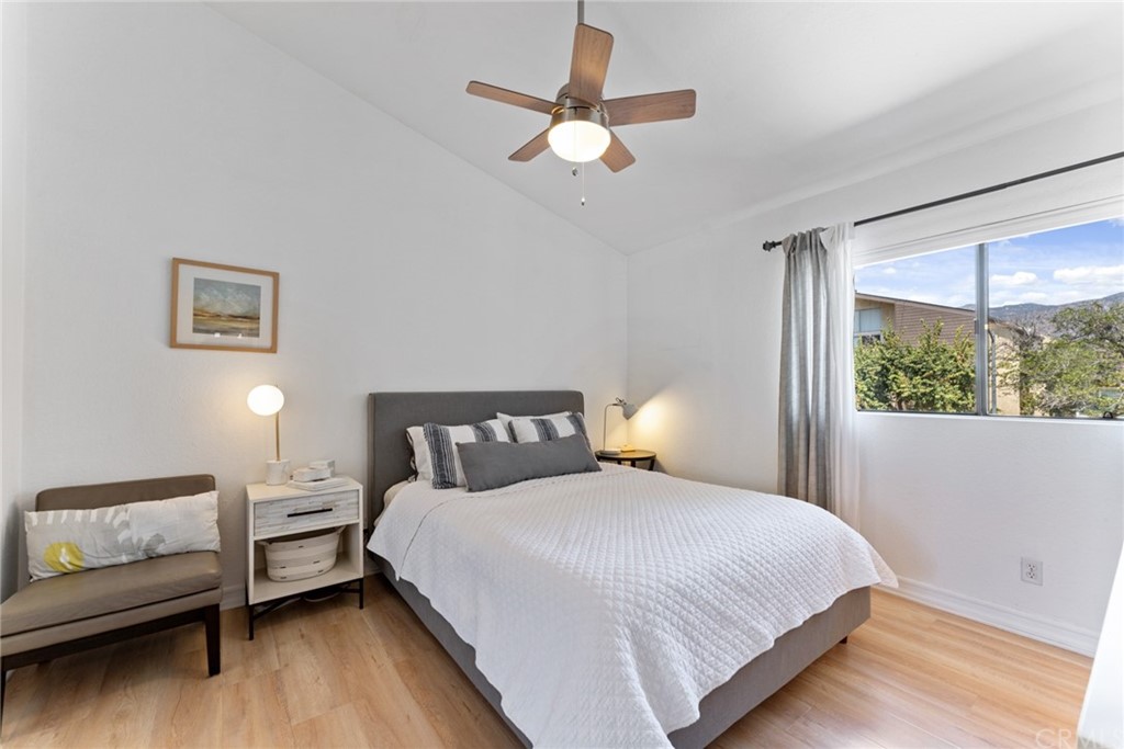 350 Burchett Street, Unit 101 Glendale, CA 91203 - Photo 18 of 27 a bedroom with a bed and a large window