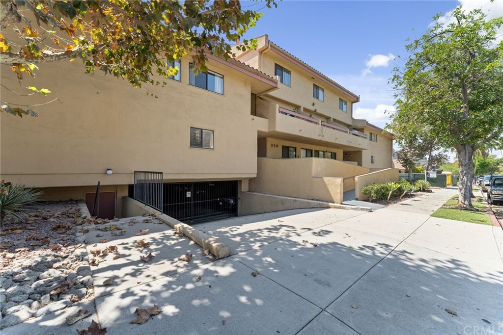 350 Burchett Street, Unit 101 Glendale, CA 91203 - Photo 27 of 27 a view of house with yard