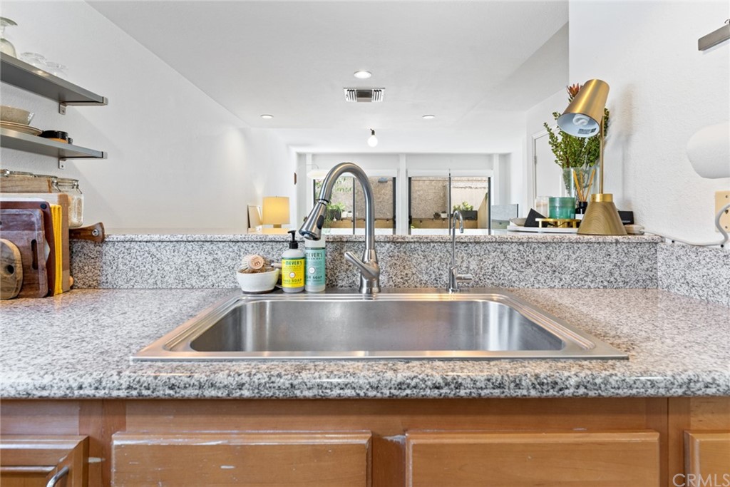 350 Burchett Street, Unit 101 Glendale, CA 91203 - Photo 5 of 27 a close view of sink and tap