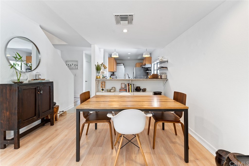 350 Burchett Street, Unit 101 Glendale, CA 91203 - Photo 8 of 27 a view of a dining room with furniture