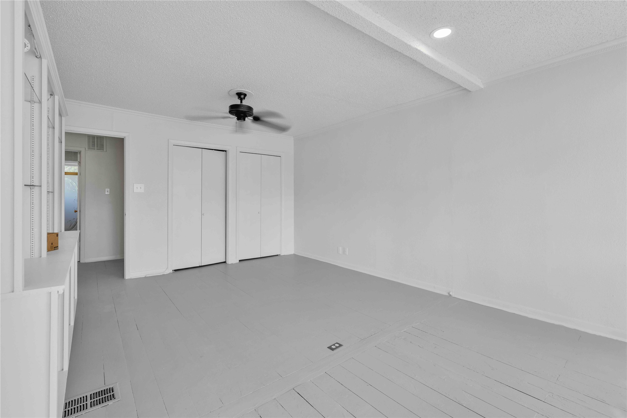 5210 Woodrow Avenue, Unit B Austin, TX 78756 - Photo 14 of 23 wooden floor in an empty room
