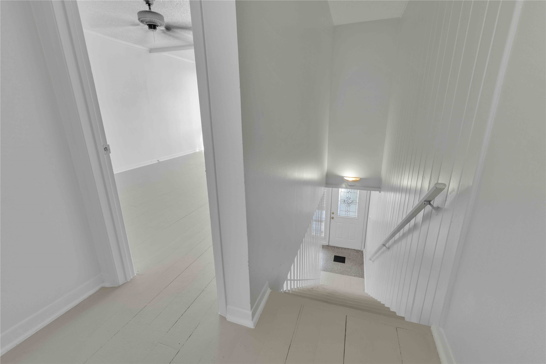 5210 Woodrow Avenue, Unit B Austin, TX 78756 - Photo 18 of 23 a view of a hallway with staircase