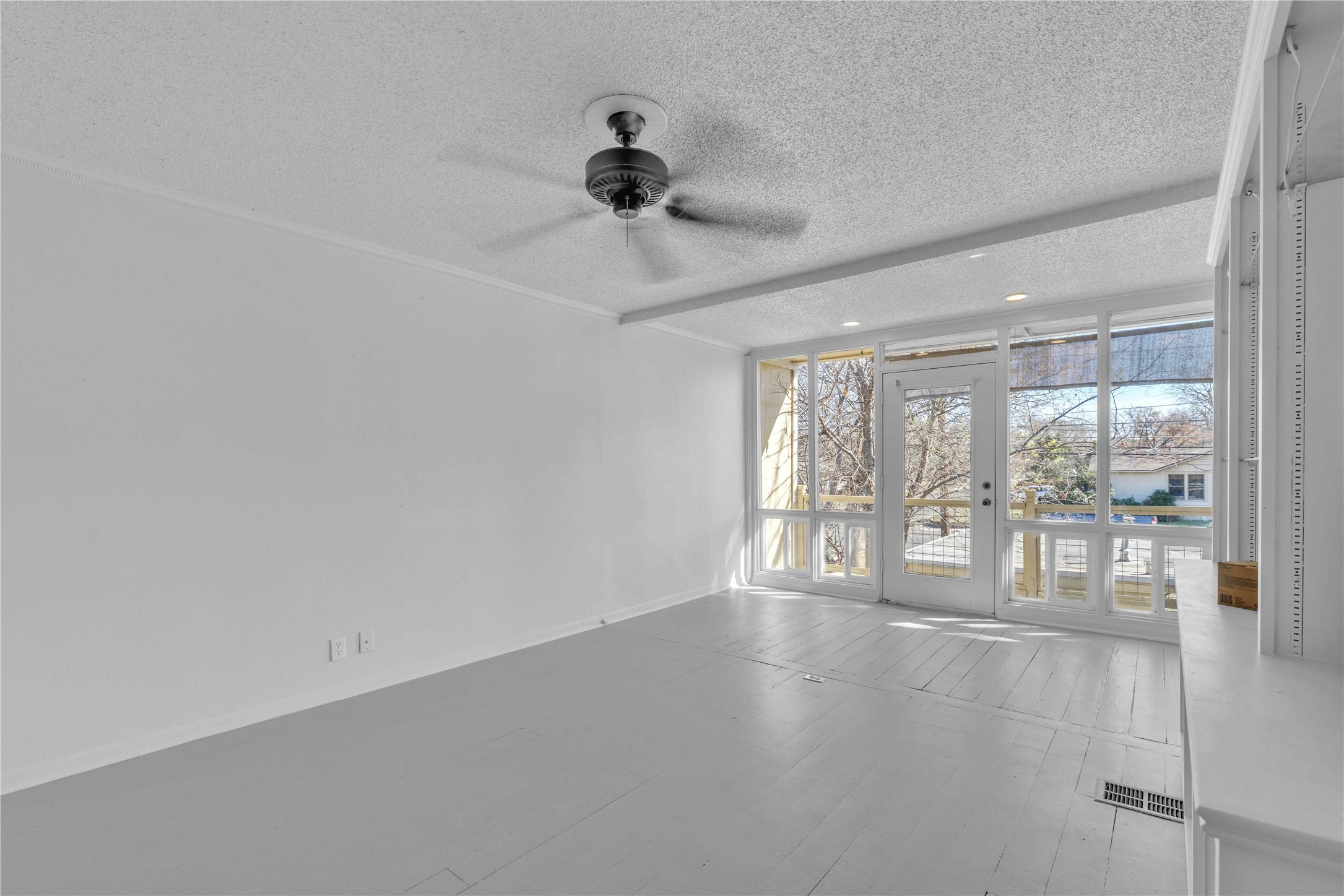 5210 Woodrow Avenue, Unit B Austin, TX 78756 - Photo 4 of 23 a view of an empty room with a window