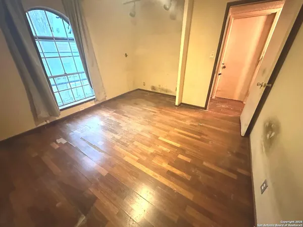 an empty room with windows