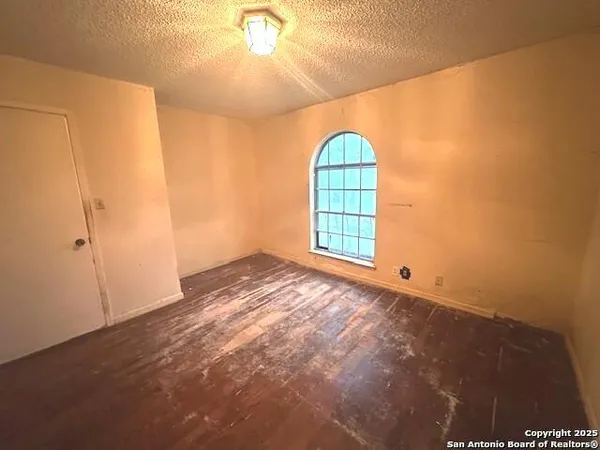 a bathroom with a toilet sink and shower