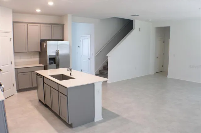 a utility room with washer and dryer